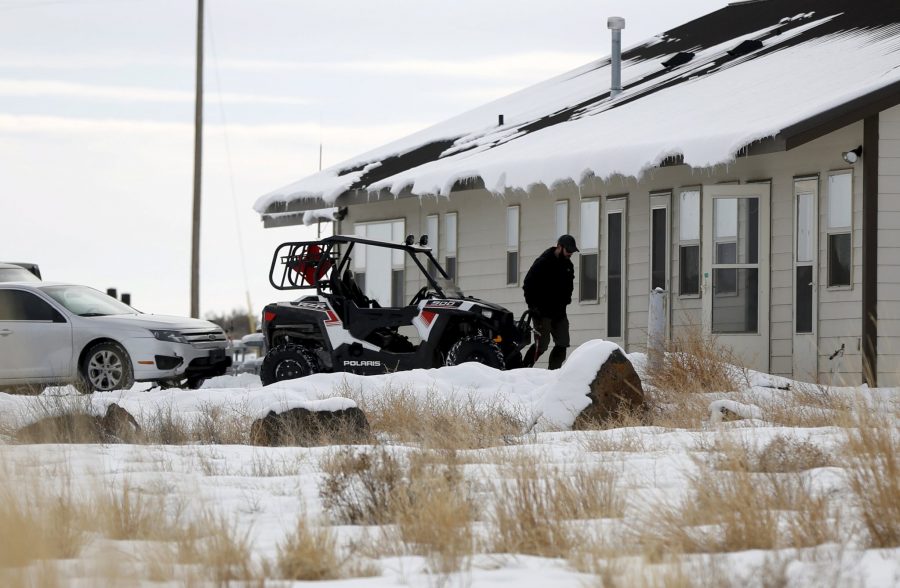 An occupier walks to a housing unit at the Malheur National Wildlife Refuge near Burns, Oregon, January 4, 2016. The leaders of a group of self-styled militiamen who took over a U.S. wildlife refuge headquarters over the weekend said on Monday they had acted to protest the federal governments role in governing wild lands. Ammon Bundy, a leader of the group, told reporters outside the occupied facility on Monday that his group had named itself Citizens for Constitutional Freedom and was trying to restore individual rights. Bundy and law enforcement officials declined to say how many people were occupying the refuge headquarters. REUTERS/Jim Urquhart