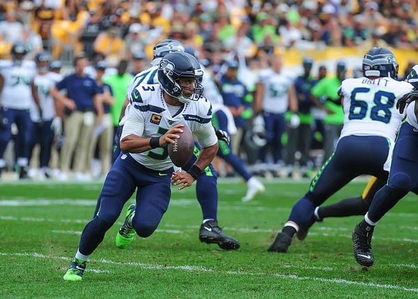 Russell Wilson Goes Chic in a Teal Suit for Broncos vs. Seahawks