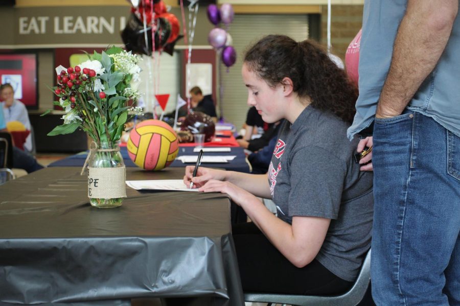 On Athlete Signing Day, senior Emily Guedel makes her decision to play Water Polo at Biola University official.