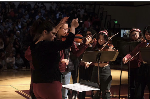 The MIHS Orchestra performs during a assembly 