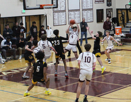 Boys Basketball Surmounted by Bellevue at Home