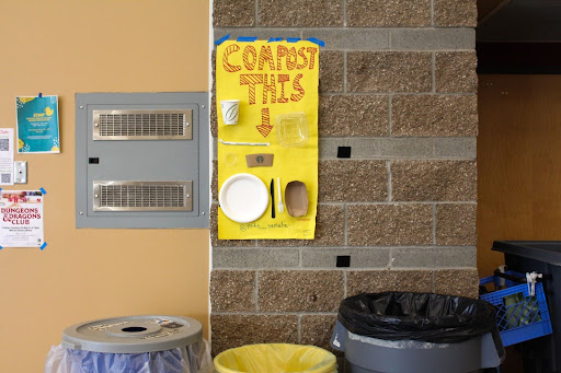 One of the compost bins and signs in the MIHS Commons.