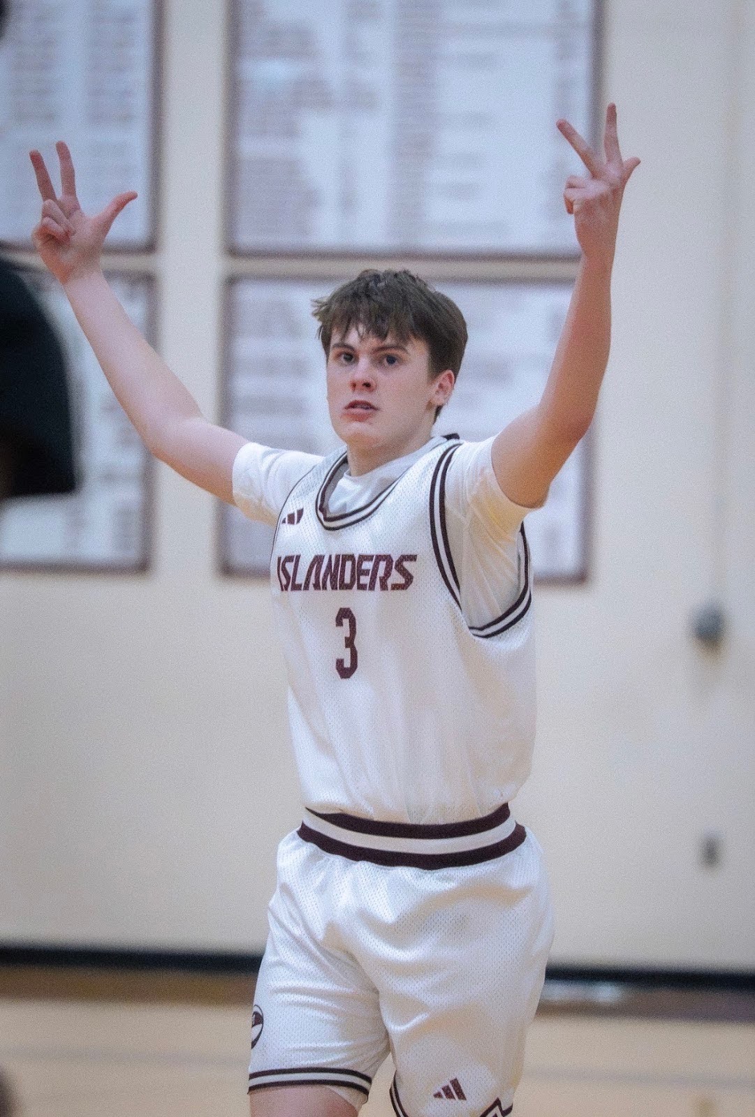 Sophomore Caden Conklin after scoring a three pointer in the second quarter.   